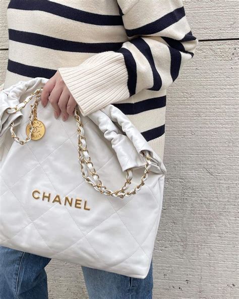 white crochet chanel purse|chanel 22 bag small price.